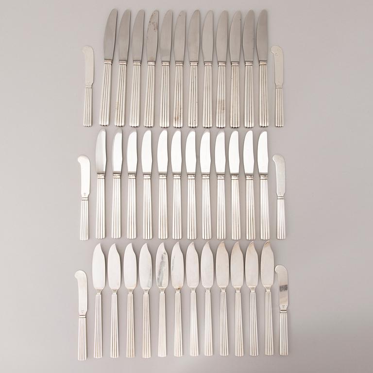 A 106 PIECE SILVER 'Bernadotte' cutlery set for George Jensen Denmark 1945-1977.
