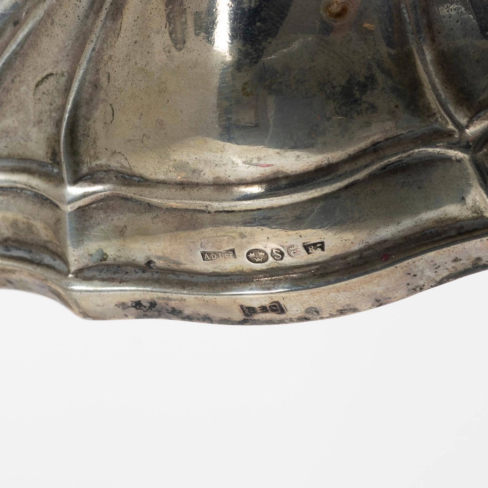 Kandelabrar, ett par, silver, rokokostil, svensk importstämpel Adolf Landoff, Göteborg 1931.