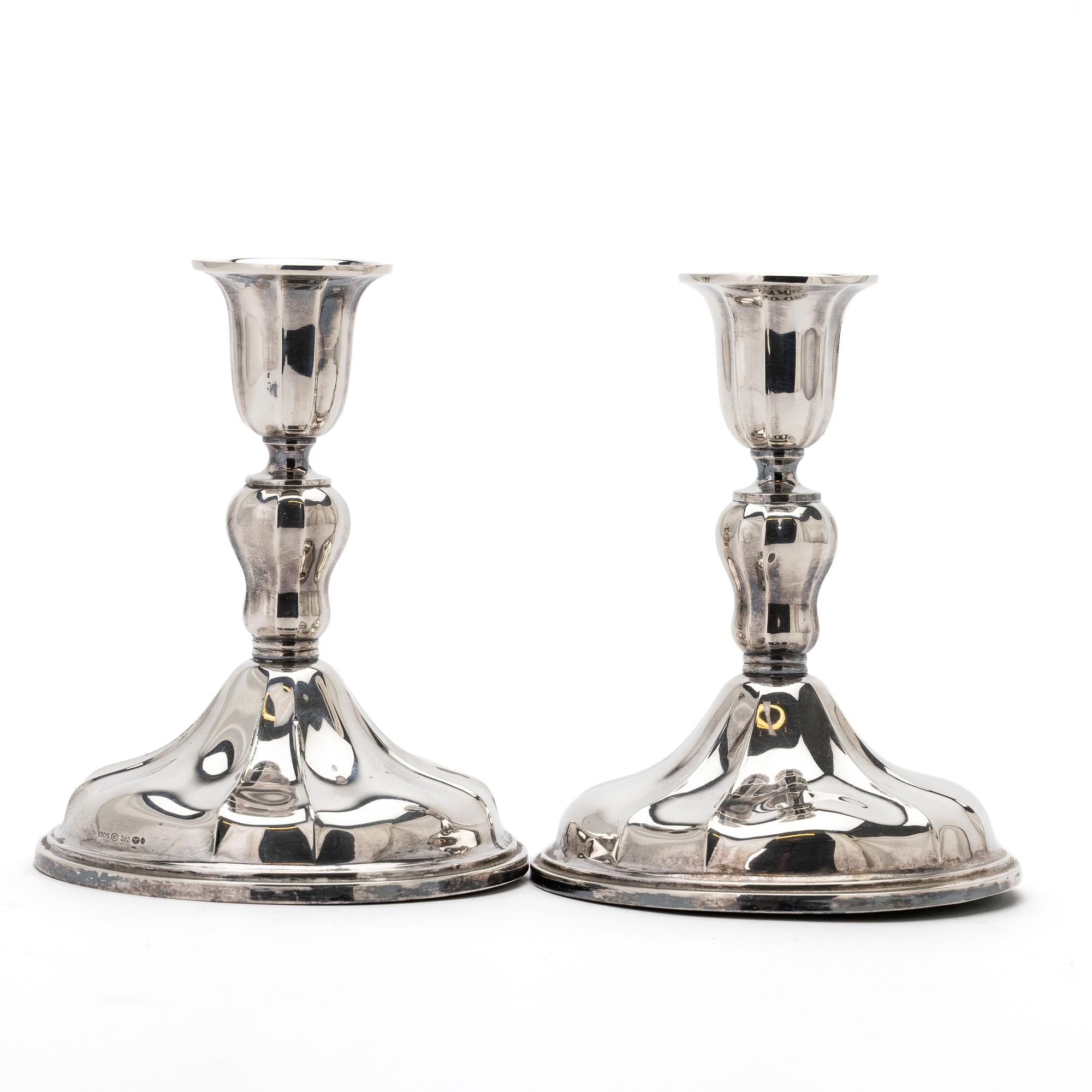 Candlesticks, a pair, Baroque style, silver, 20th century.