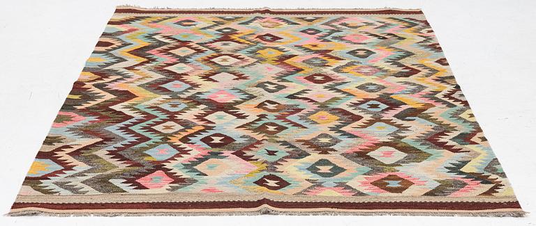 A Kelim carpet, c. 240 x 178 cm.