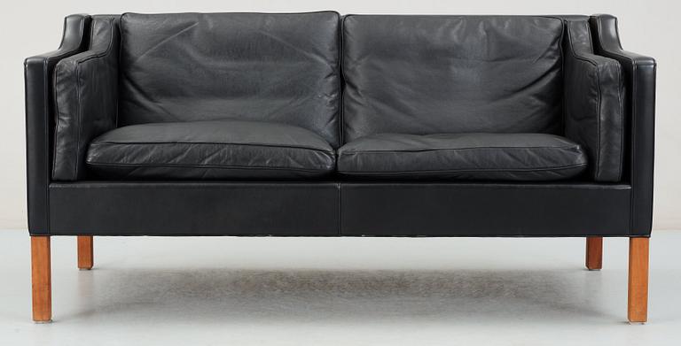 A Børge Mogensen black leather two seated sofa, Fredericia, Denmark.