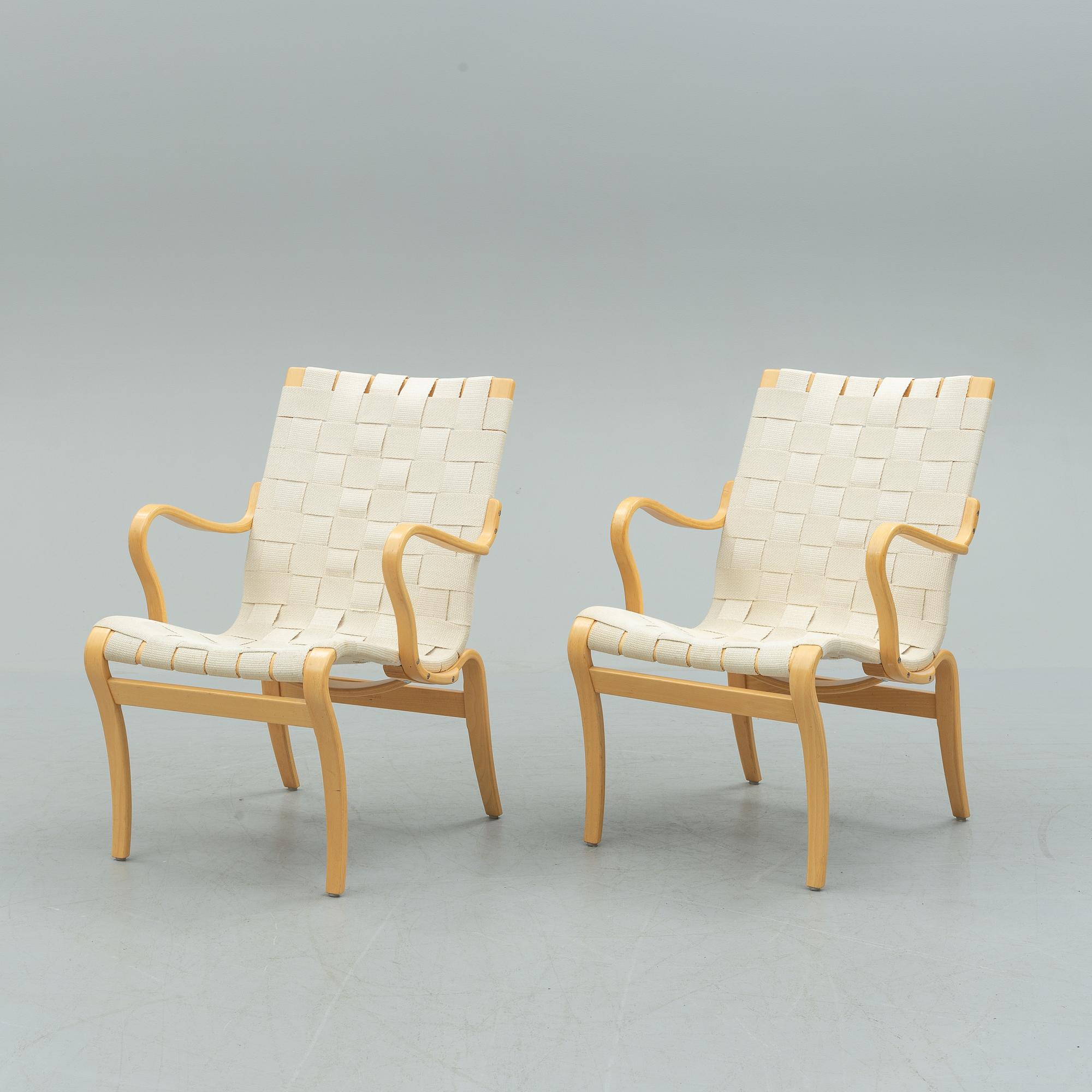 A pair of second half of the 20th century 'Mina' armchairs by Bruno Mathsson.