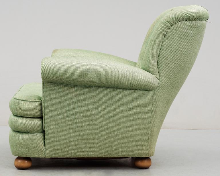 A Josef Frank armchair by Svenskt Tenn.