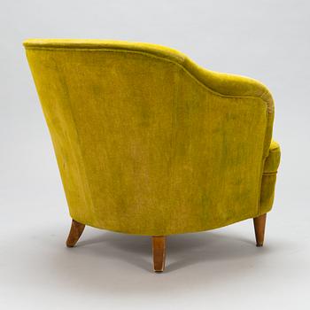 A mid-20th-century armchair.