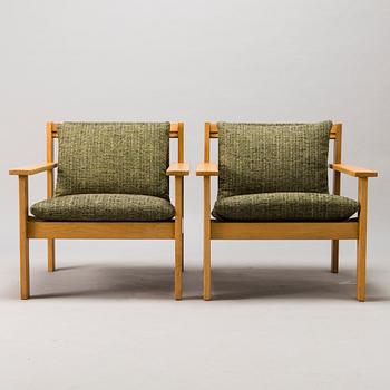 CARL GUSTAF HIORT AF ORNÄS,  a pair of 1960s, 'Tapio' armchairs for Puunveisto Oy - Wood work Ltd.