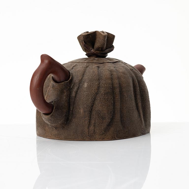 Zhou Dingfang, A naturalistic 'sack form' yixing teapot, China, 1990s.