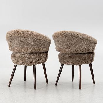 A pair of upholstered armchairs, AB Bröderna Biörs Snickerifabrik, Sweden, 1950's.