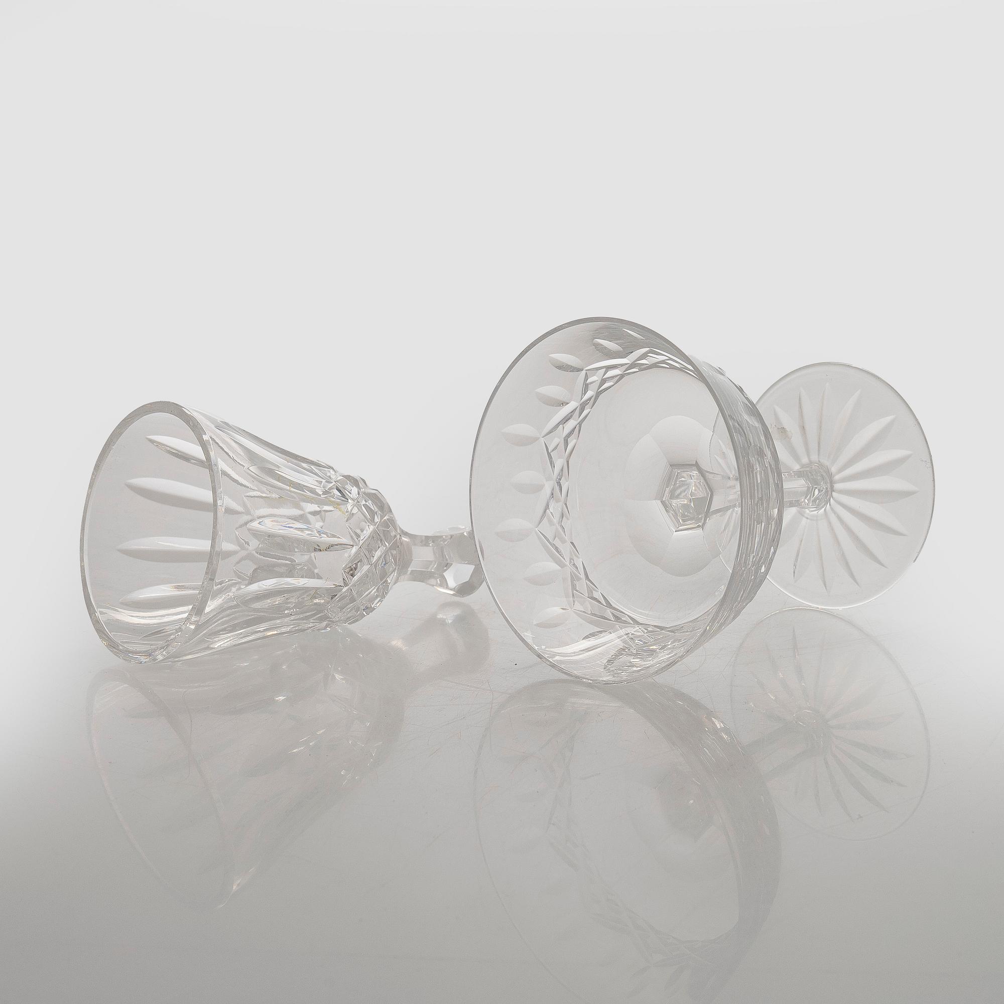 A set of 13 dessert bowls / champagne glasses, Waterford. and a table clock.