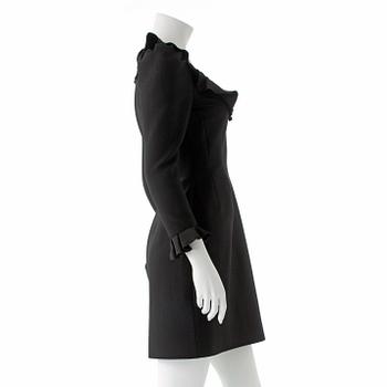 LANVIN, a black wool blend dress with ruffles.
