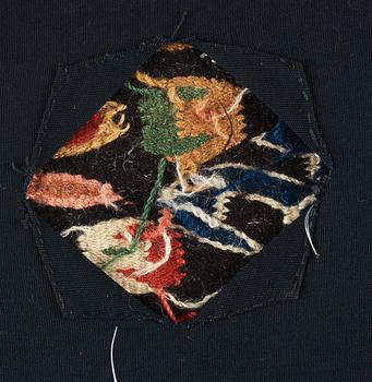 A CARRIAGE CUSHION FRAGMENT, tapestry weave, "Den innelykta fågeln", ca 52 x 67 cm, Scania (Sweden).