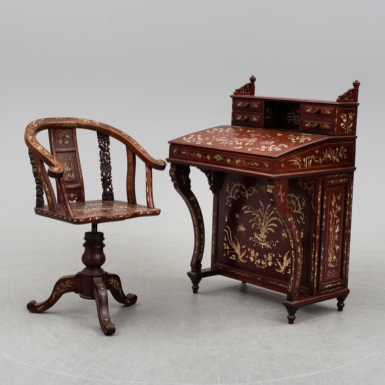 A first half of the 20th cnetury writing desk and chair.