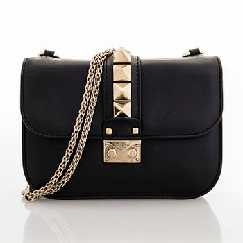 Valentino Garavani, a 'Glam Lock' bag.