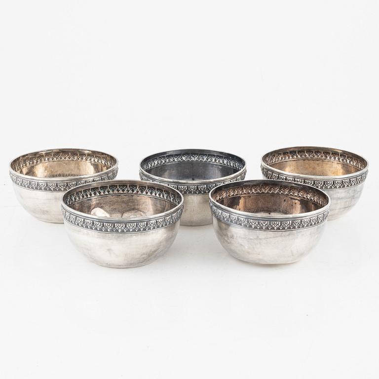 Five sterling silver bowls.
