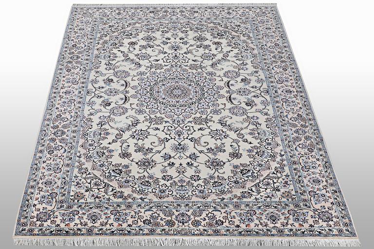 A carpet, Nain, part silk, 6 laa, c. 250 x 160 cm.