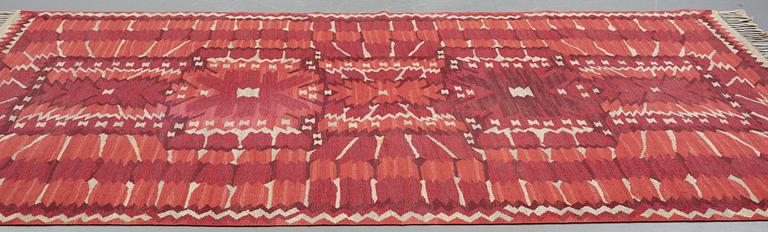 Barbro Nilsson, a carpet, "Strålblomman, röd", flat weave, ca 313,5-316 x 201,5-204,5 cm, signed AB MMF BN.