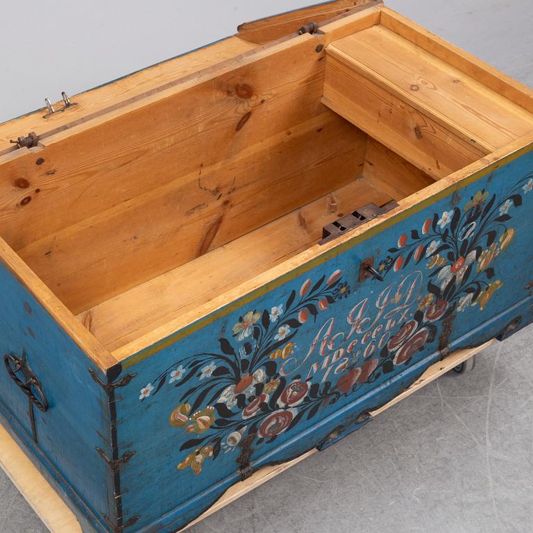 A painted century chest, dated 30/10 1860.