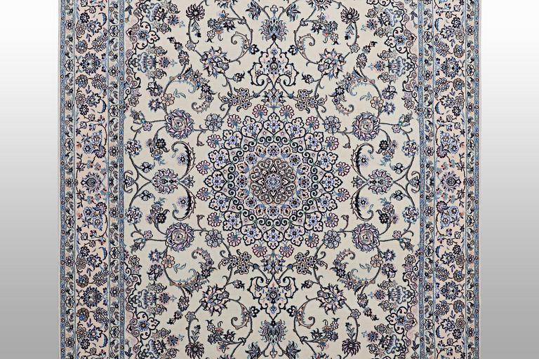 A carpet, Nain, part silk, 6 laa, c. 250 x 160 cm.