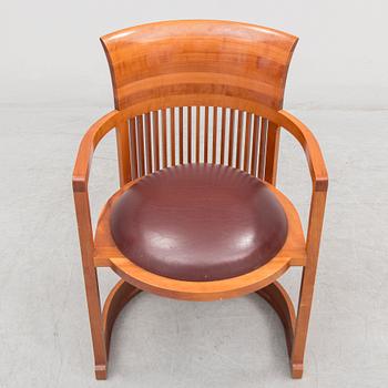 FRANK LLOYD WRIGHT, A cherry wood 'Barrel chair' from Cassina, late 20th century.