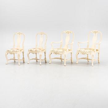 A set of four 20th century Rococo-style chairs.