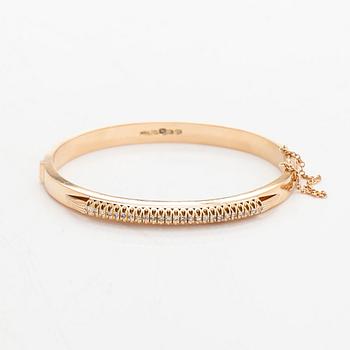 Armband, 14K guld och åttkantsslipade diamanter, Kulta-Hamara Oy, Helsingfors 1959.