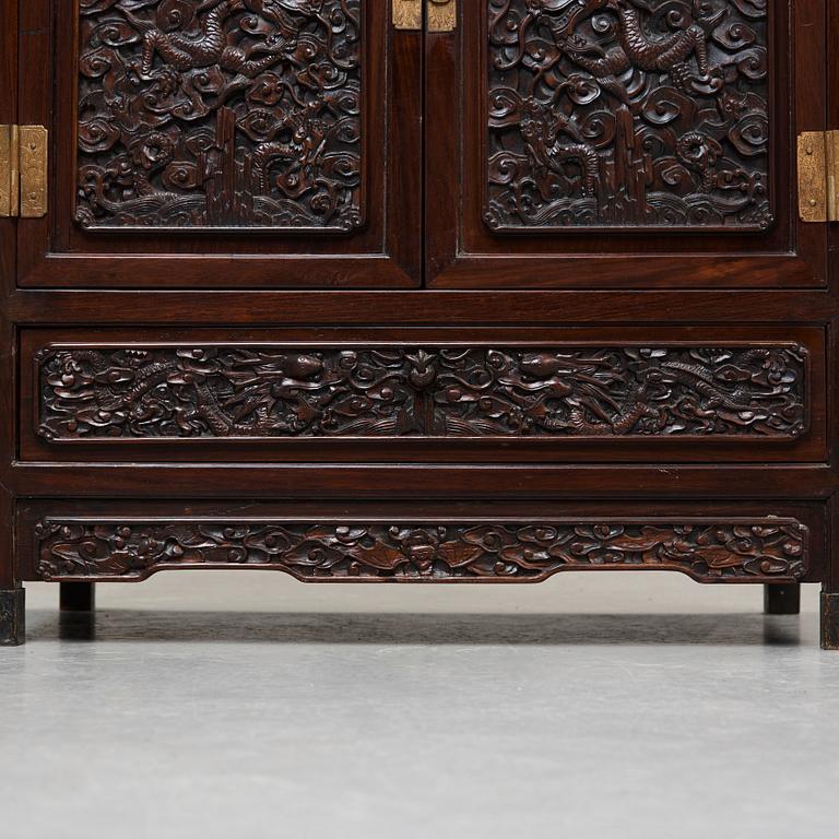 A pair of Chinese hardwood cupboards, late Qing dynasty (1644-1912).