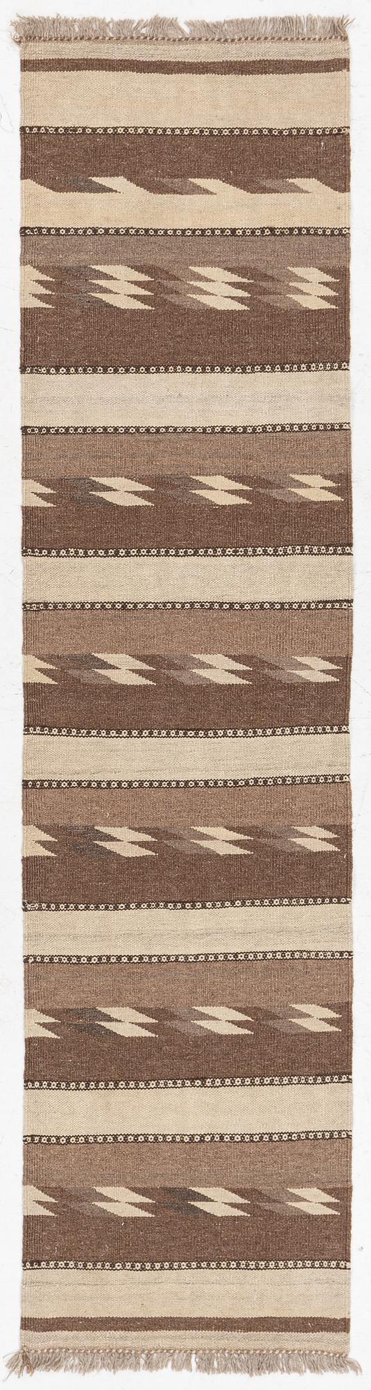 A Persian kilim runner, c. 248 x 62 cm.