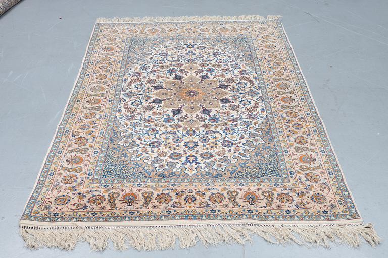 A rug, Old Esfahan, part silk, ca 242,5 x 149 cm.