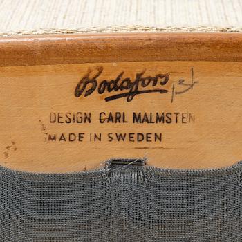 Carl Malmsten, a matched pair of easy chairs, second part of the 20th Century.
