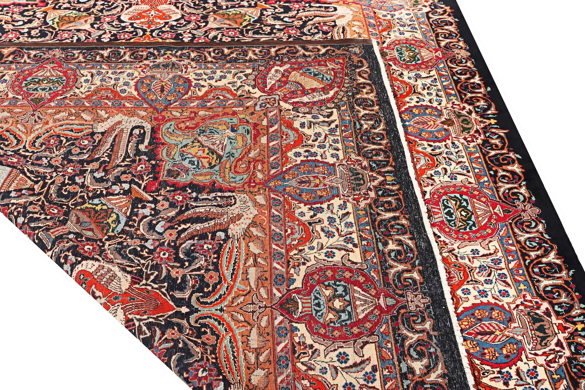 A Kashmir carpet, a. 390 x 305 cm.