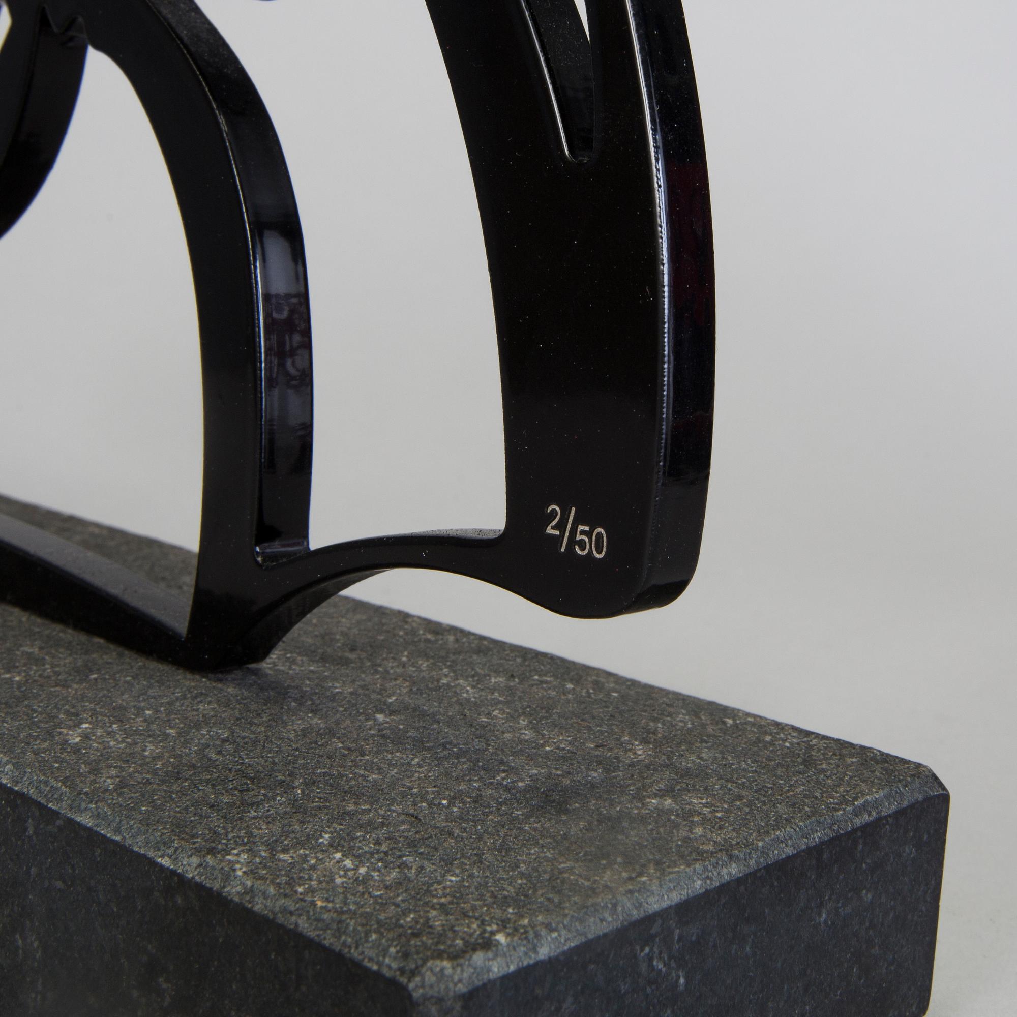 CARL FREDRIK REUTERSWÄRD, culpture, black painted steel on base of stone, signed CFR and numbered 2/50.