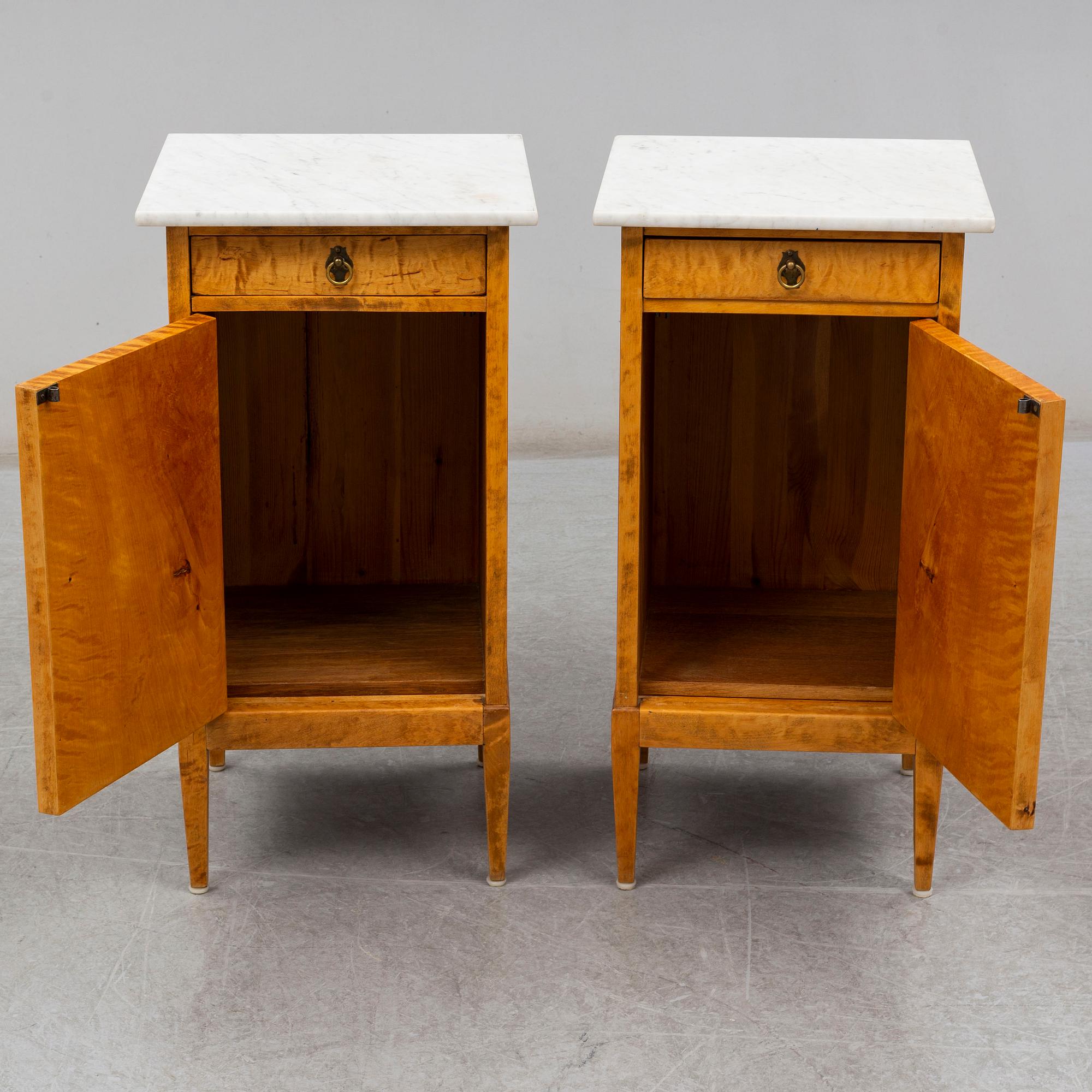 A pair of bedside tables from the first half of the 20th century.