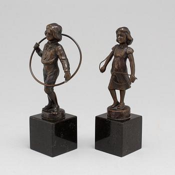 JULIUS SCHMIDT-FELLING, sculptures, a pair, bronze, signed.