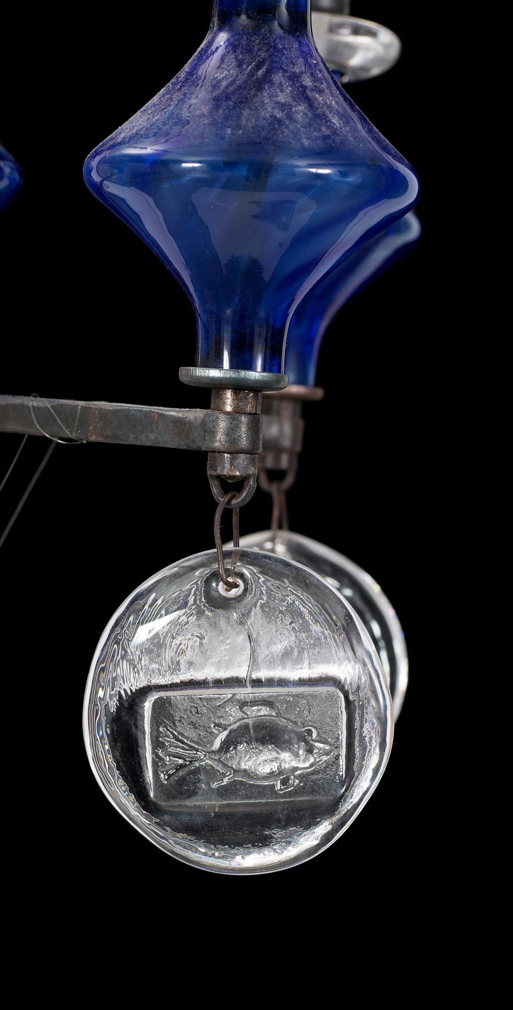 LJUSKRONA, glas, järnsmide, Erik Höglund. H 63.