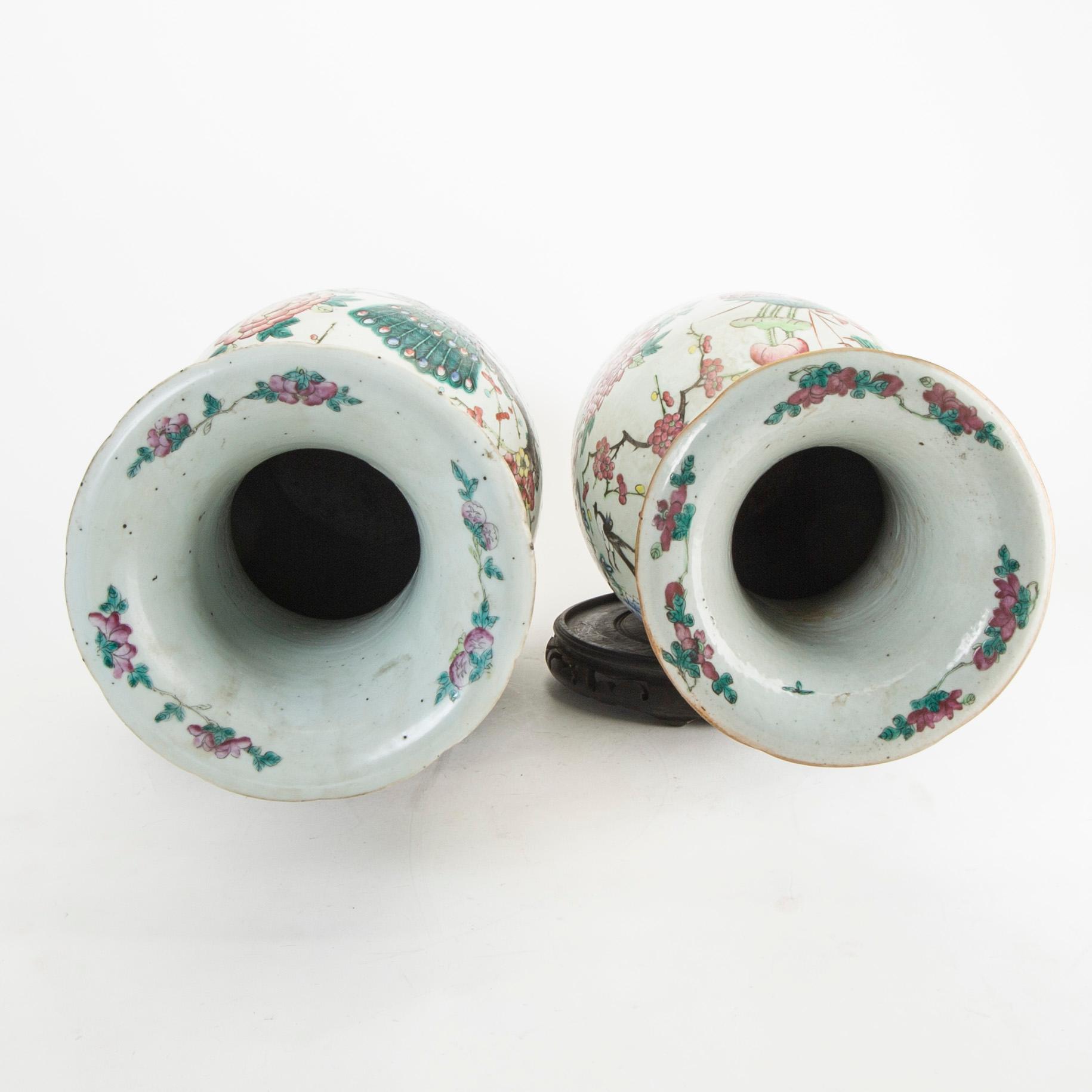 A pair of famille rose vases, late Qing dynasty, circa 1900.