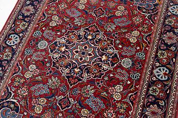 An oriental carpet, approx. 170 x 100 cm.