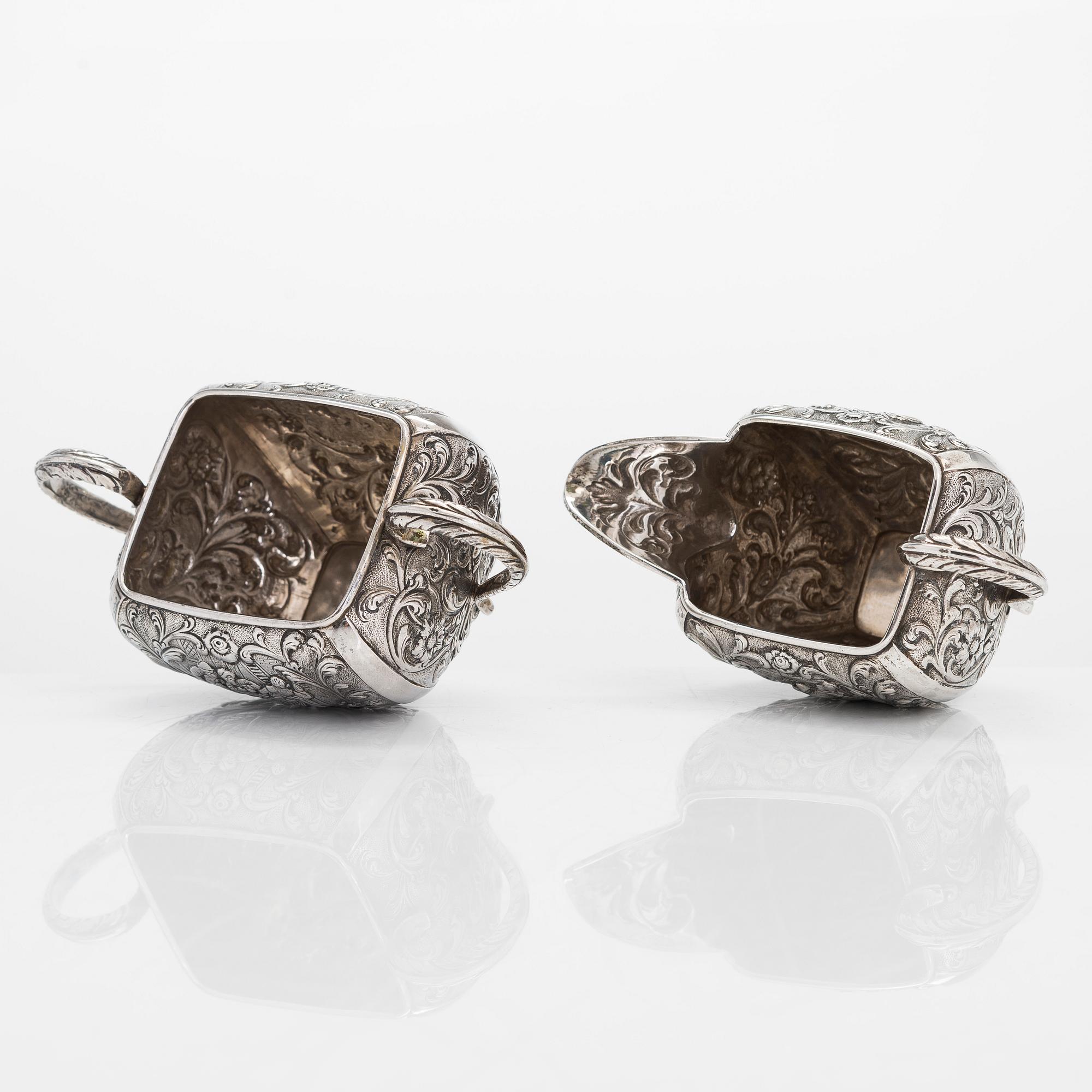 A 1940s Dutch silver sugar bowl and cream jug on a tray, Amsterdam, 1947 and 1942.