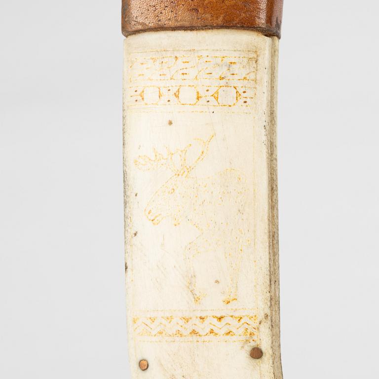 A reindeer horn knife signed H.J.