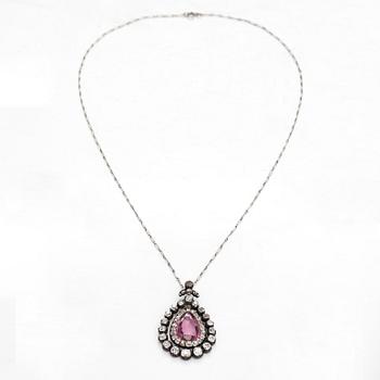 A silver necklace with a synthetic spinel and diamonds ca. 3.00 ct in total. Late 19th century.