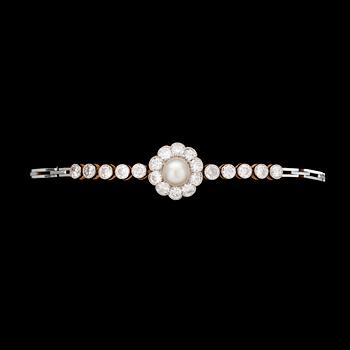 1150. ARMBAND, briljantslipade diamanter, tot. ca 1.60 ct, med orientalisk pärla, 1930-tal.