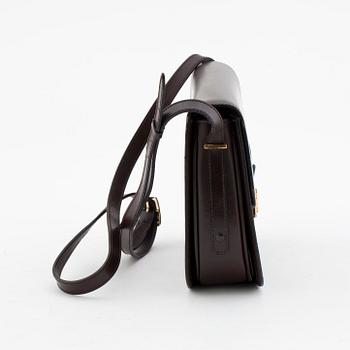 CÉLINE, a brown leather shoulderbag.