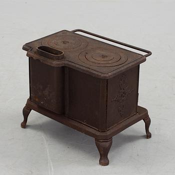 A cast iron toy stove, Husqvarna, Sweden, early 20th century.