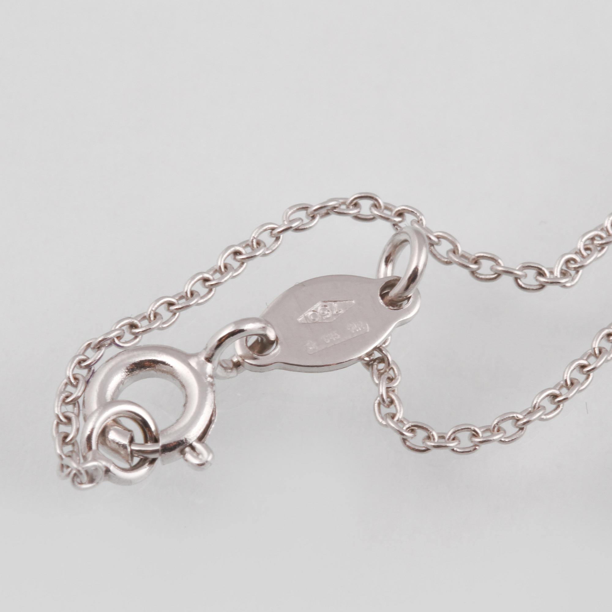HÄNGE, 18K vitguld med fasettslipade diamanter ca 0.60 ct, rubiner ca 2.31 ct samt rosa safirer ca 0.68 ct. Vikt 7,8 g.