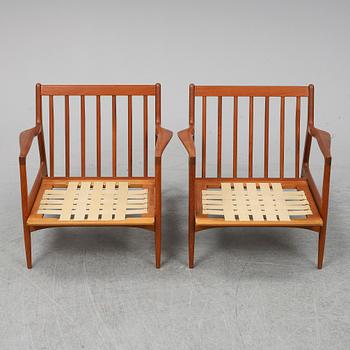 A pair of late 20th Century easy chairs.