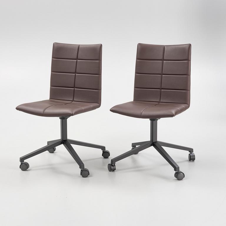 A pair of 'Archal' swivel chairs, Lammhults, Sweden.