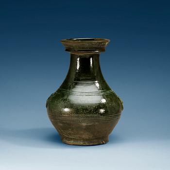 1623. A green glazed jar, Han dynasty (206 BC - 220 AD).