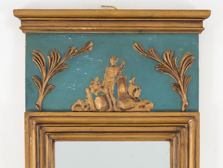 An Empire mirror marked W Lind, first half of the 19th century.