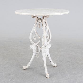 a late 20th century cast iron garden table.