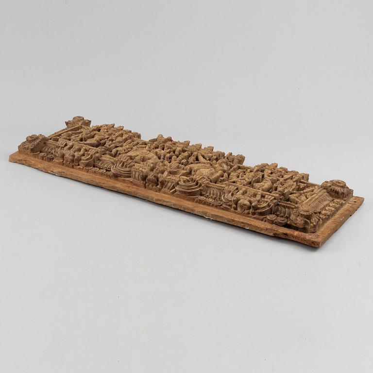 A carved wooden panel, India, circa 1900.
