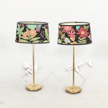 A pair of Falkenbergs belysning brass table lamp later part of the 210th century.