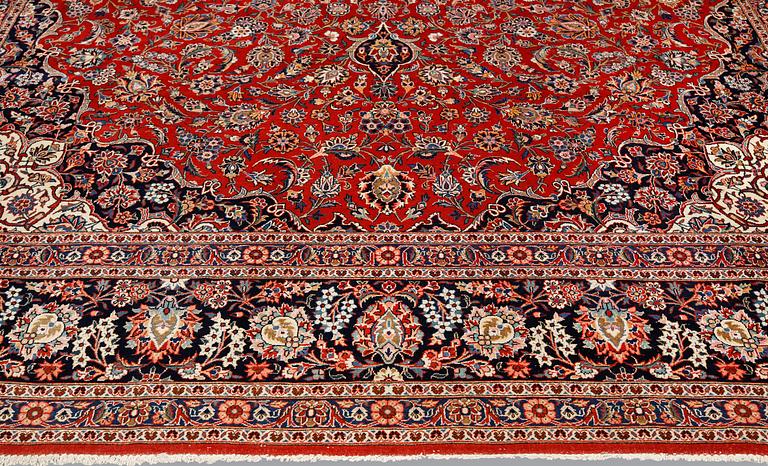 Carpet, Keshan, semi-antique, signed, 439 x 316 cm.